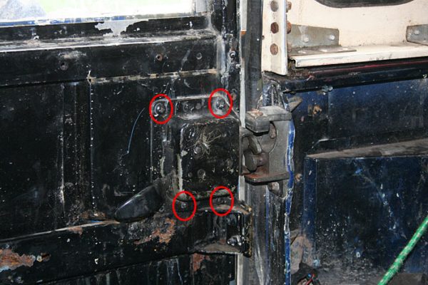 Location of the 4 mounting points of the rear door handle and lock assembly.