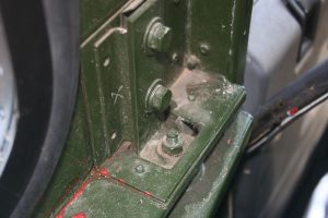 These bolts secure the hard top just behind each door