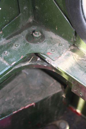 The hard top is secured in each rear corner with these bolts
