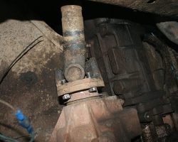 How to replace a propshaft on a Land Rover Remove the nuts from the bolts on the transfer gearbox end of the propshaft
