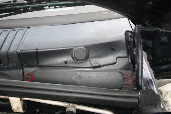 The 2 screws holding the pollen filter cover in place