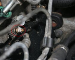 How to change the glow plugs on a diesel Range Rover P38 Location of one of the glow plugs, showing the electrical connection and 8mm nut
