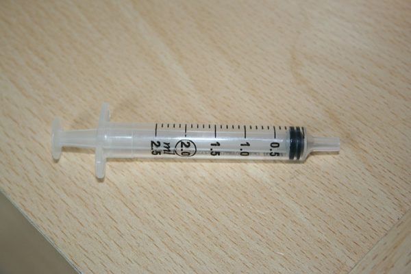 The syringe is used to prefill the new brake light switch