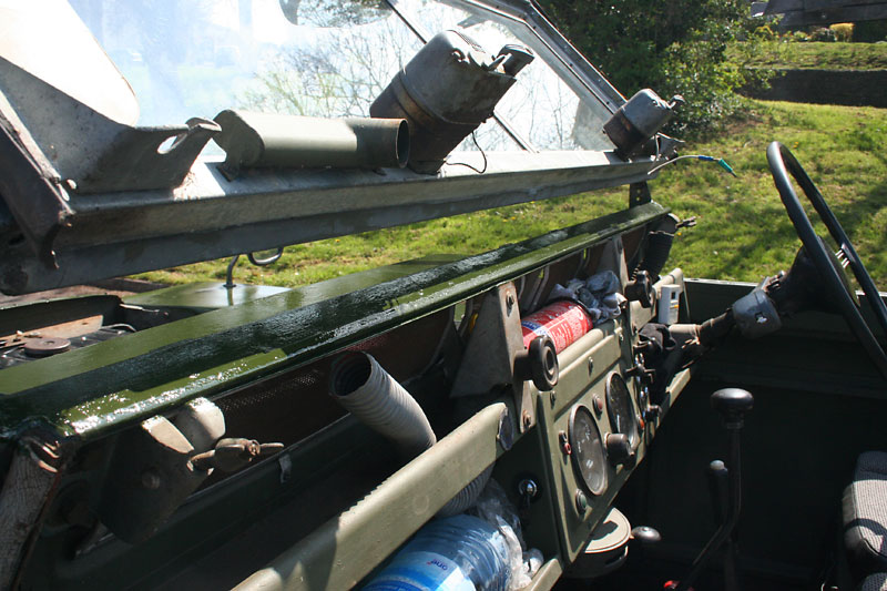 Fresh paint on the bulkhead, under the windscreen