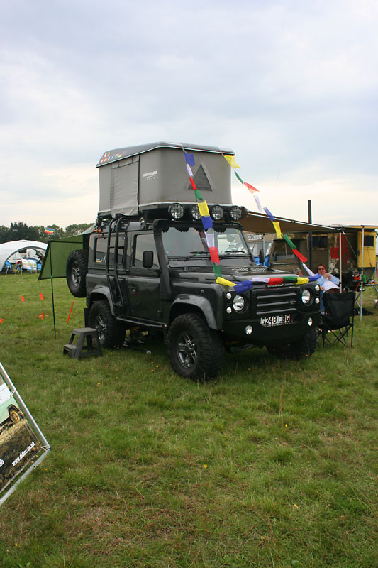 A Land Rover 90 with roof tent